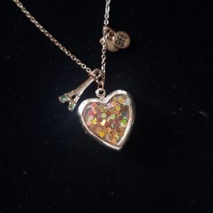 3/$20 Beautiful locket with charms (bff and aifle tower)